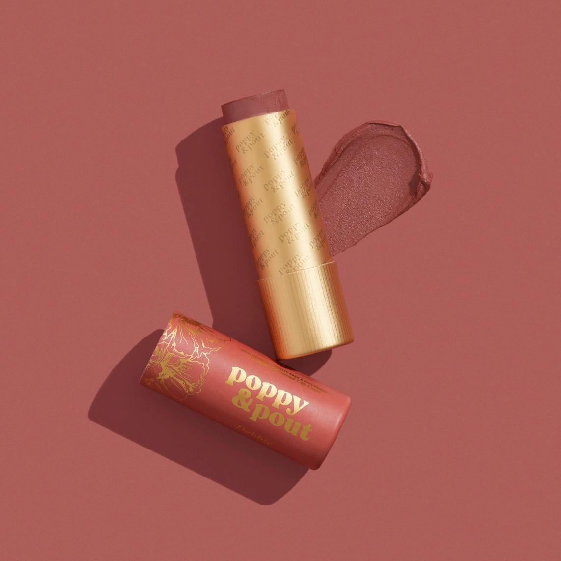 Lip tint tube with glitter applicator, gold and pink