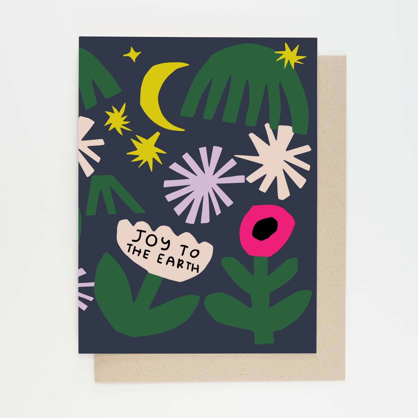 Greeting card front with green leaves, yellow moon and stars, white burst shapes, and pink ornament.