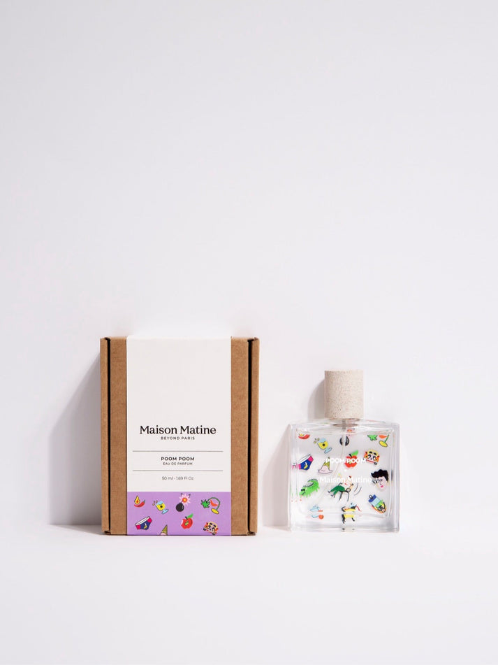 Eau de parfum gift box and clear bottle with cork stopper and character illustrations