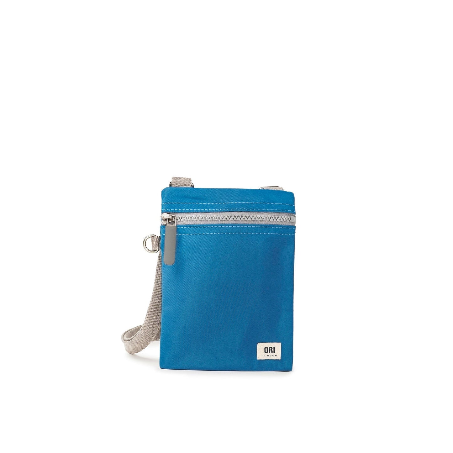 Bright blue recycled nylon pocket crossbody bag with zip top and gray adjustable strap