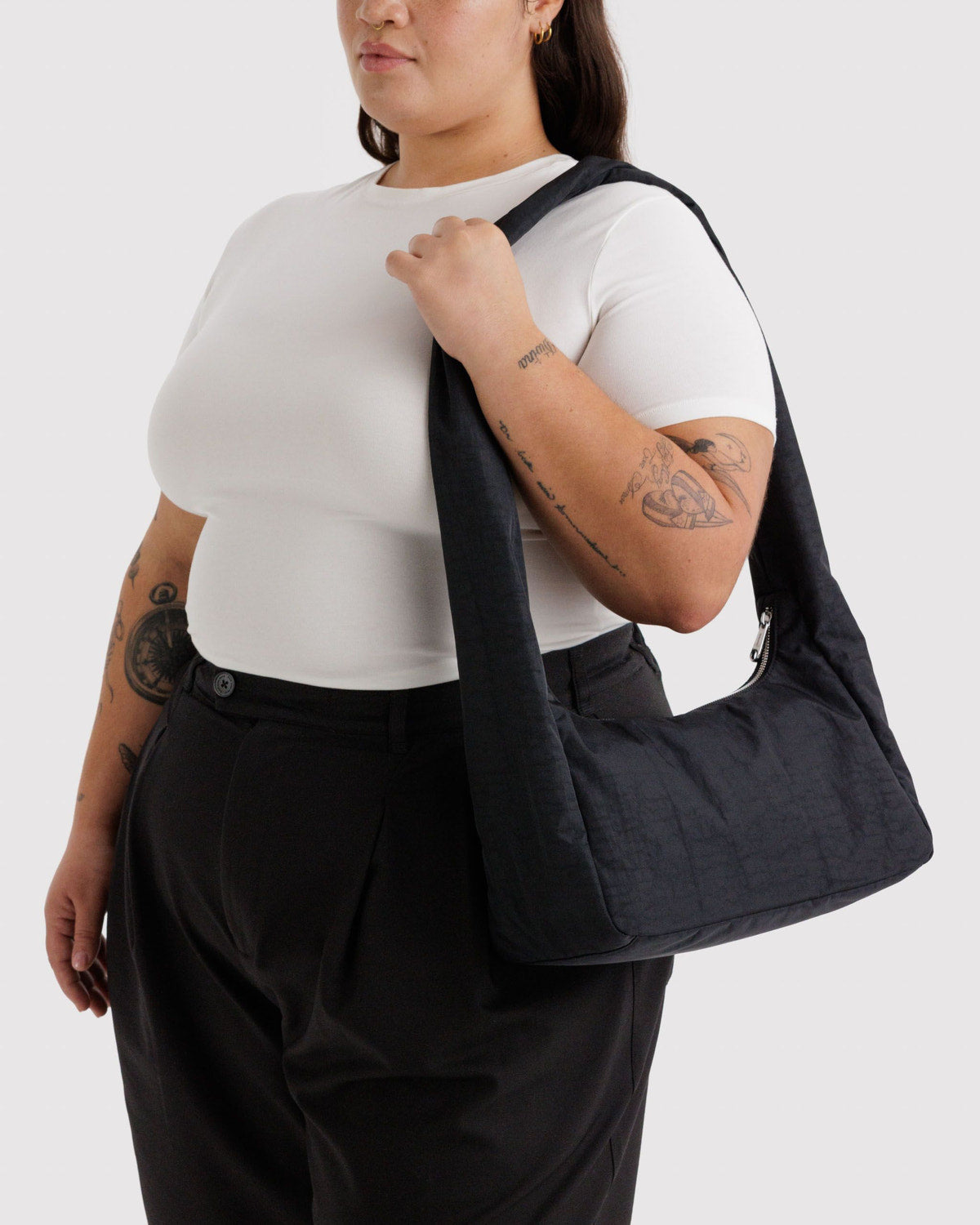Nylon shoulder bag in black, slouchy with single top handle.