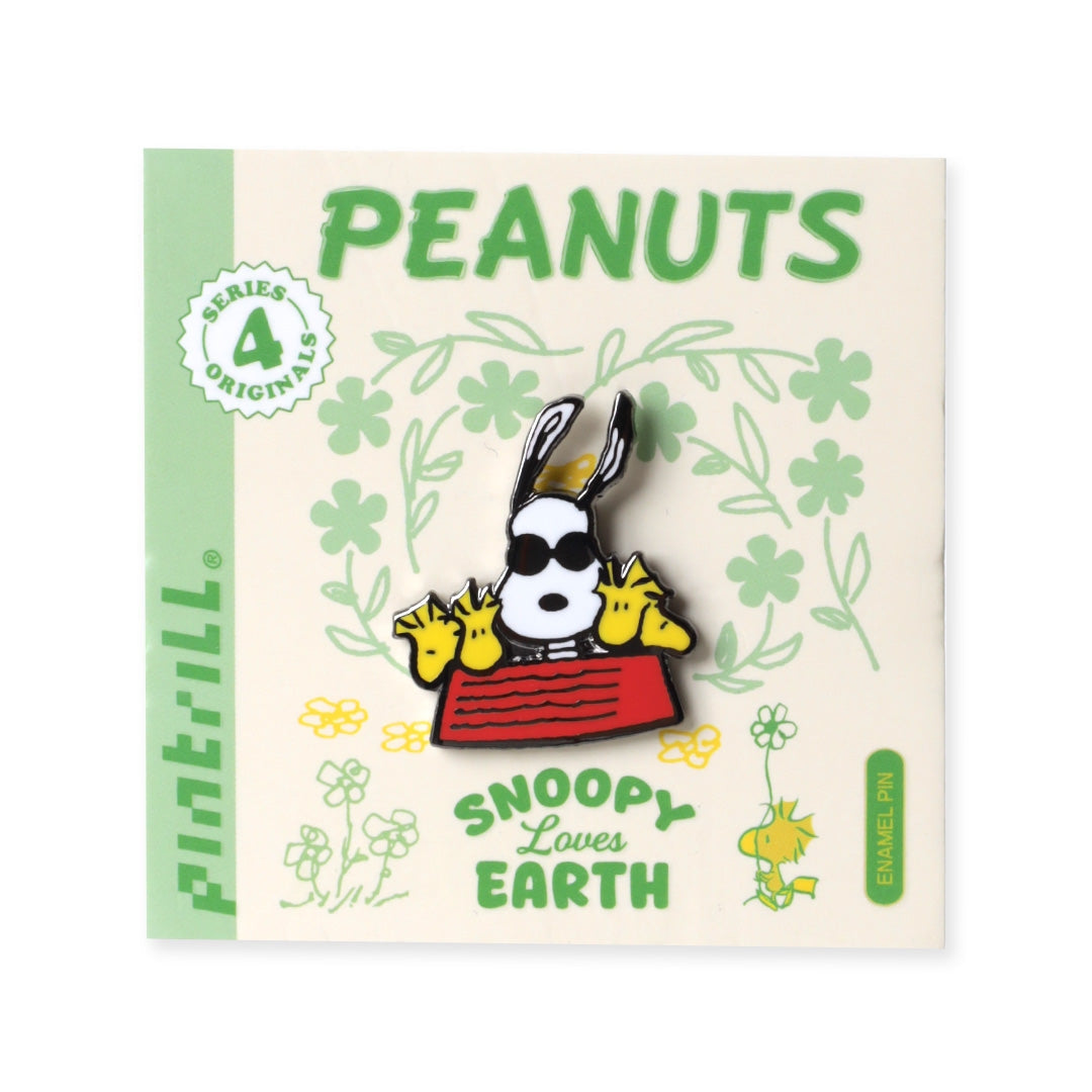 Snoopy enamel pin on PEANUTS card with green 'Snoopy Lover of Earth' text