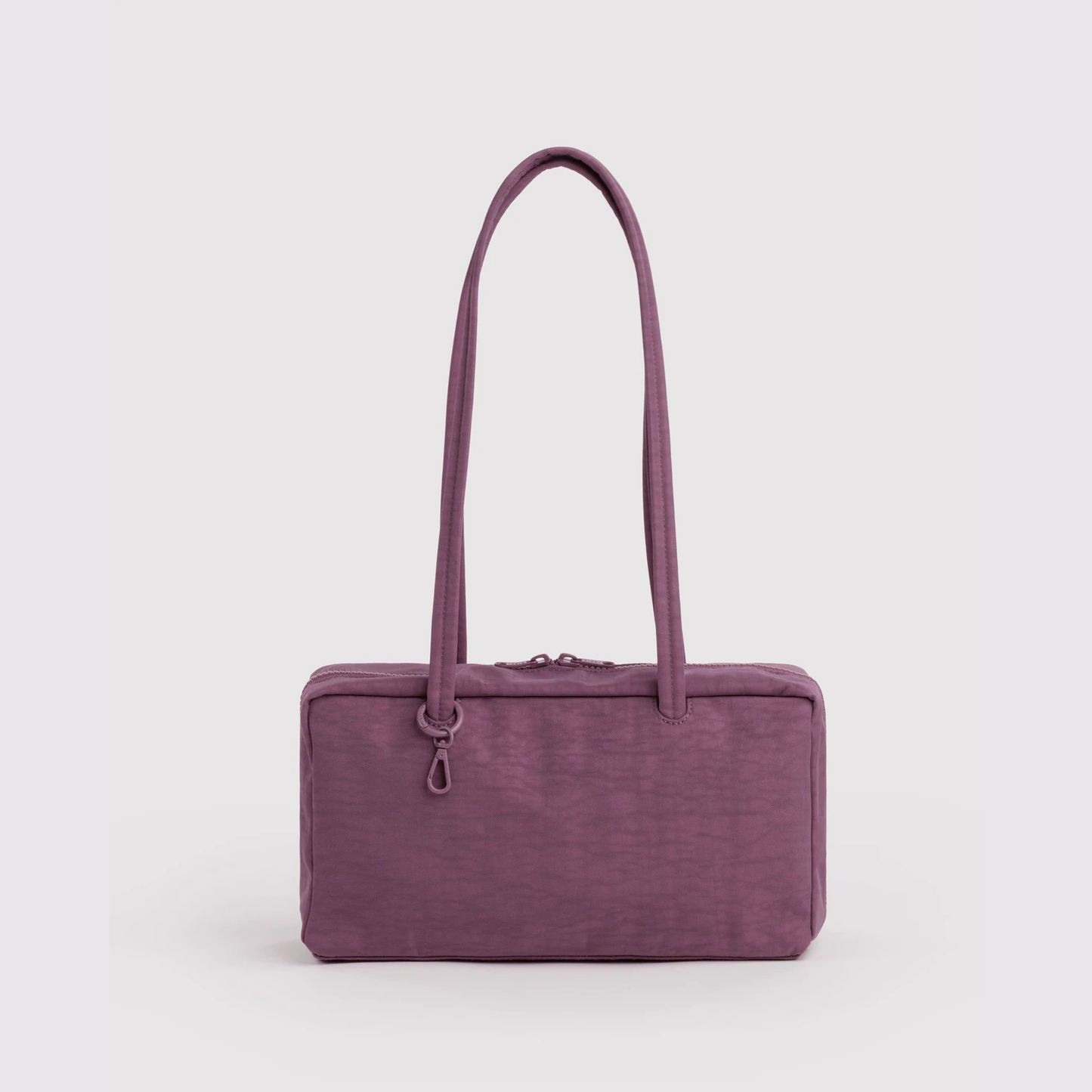 Nylon bowler bag in plum purple with top handles and zip closure, front view