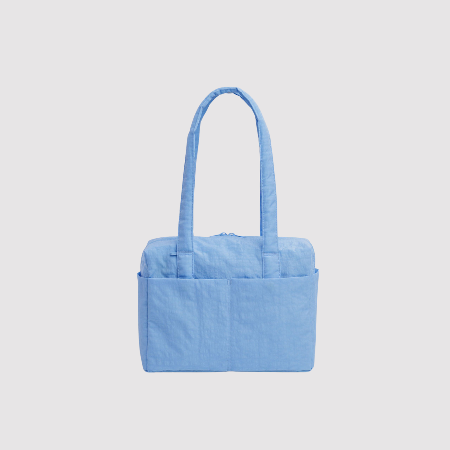 Light blue fabric tote bag with top handles and zippered top
