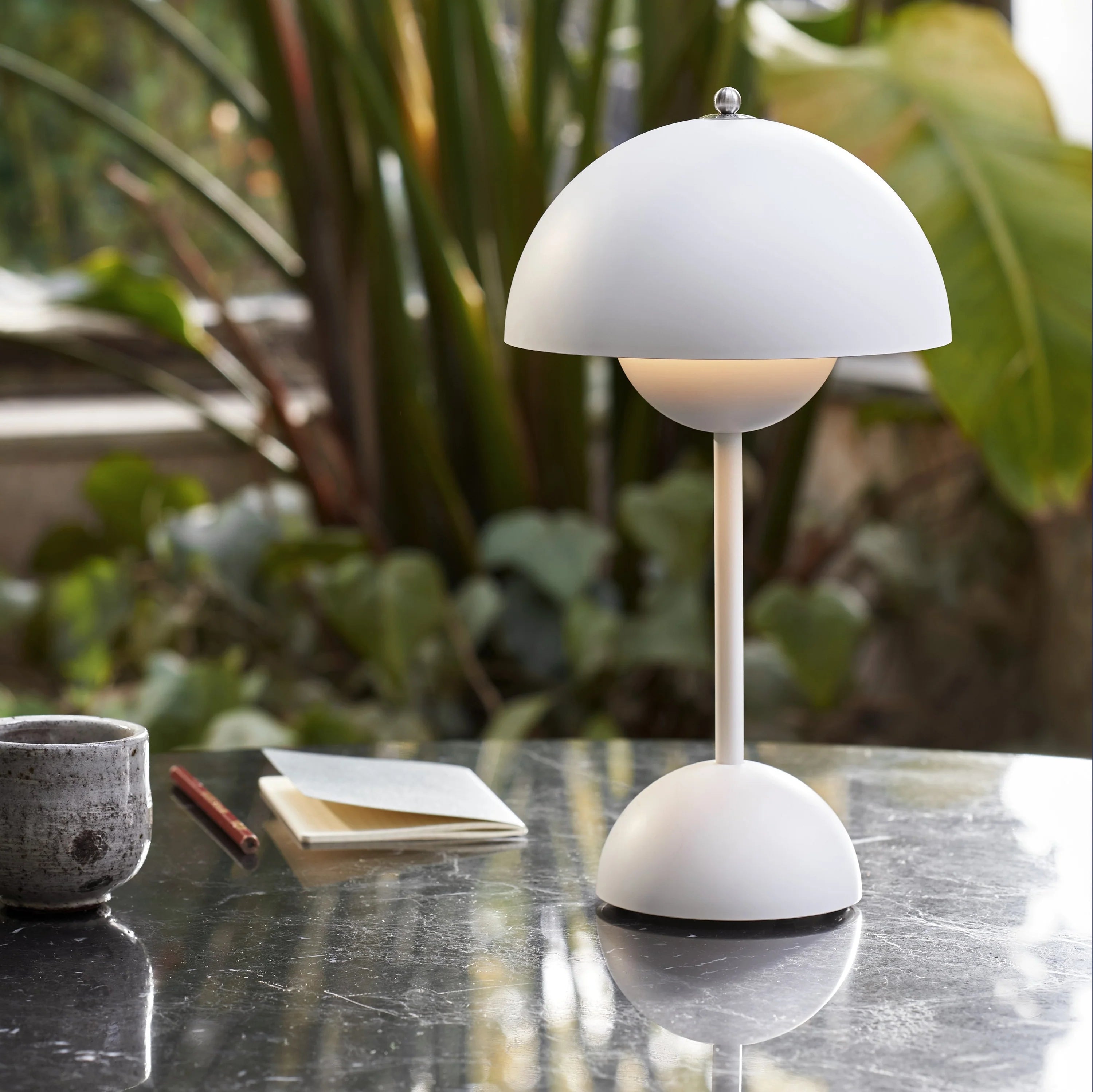 White portable table lamp with dome shade and round base