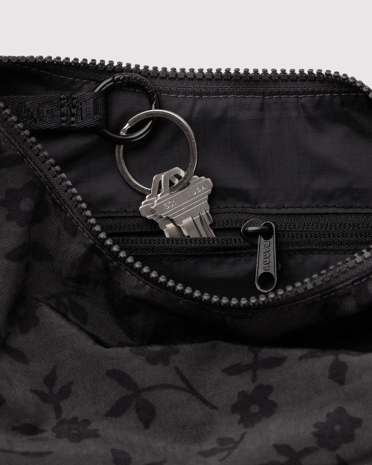 Small nylon crescent bag, black floral fabric with key clip and zipper pull