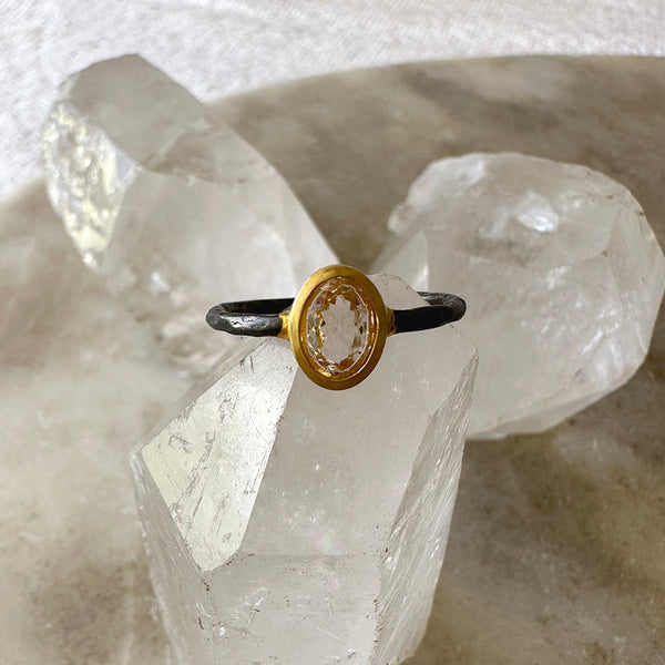 Oval morganite ring, gold vermeil setting with oxidized silver band, flat top view