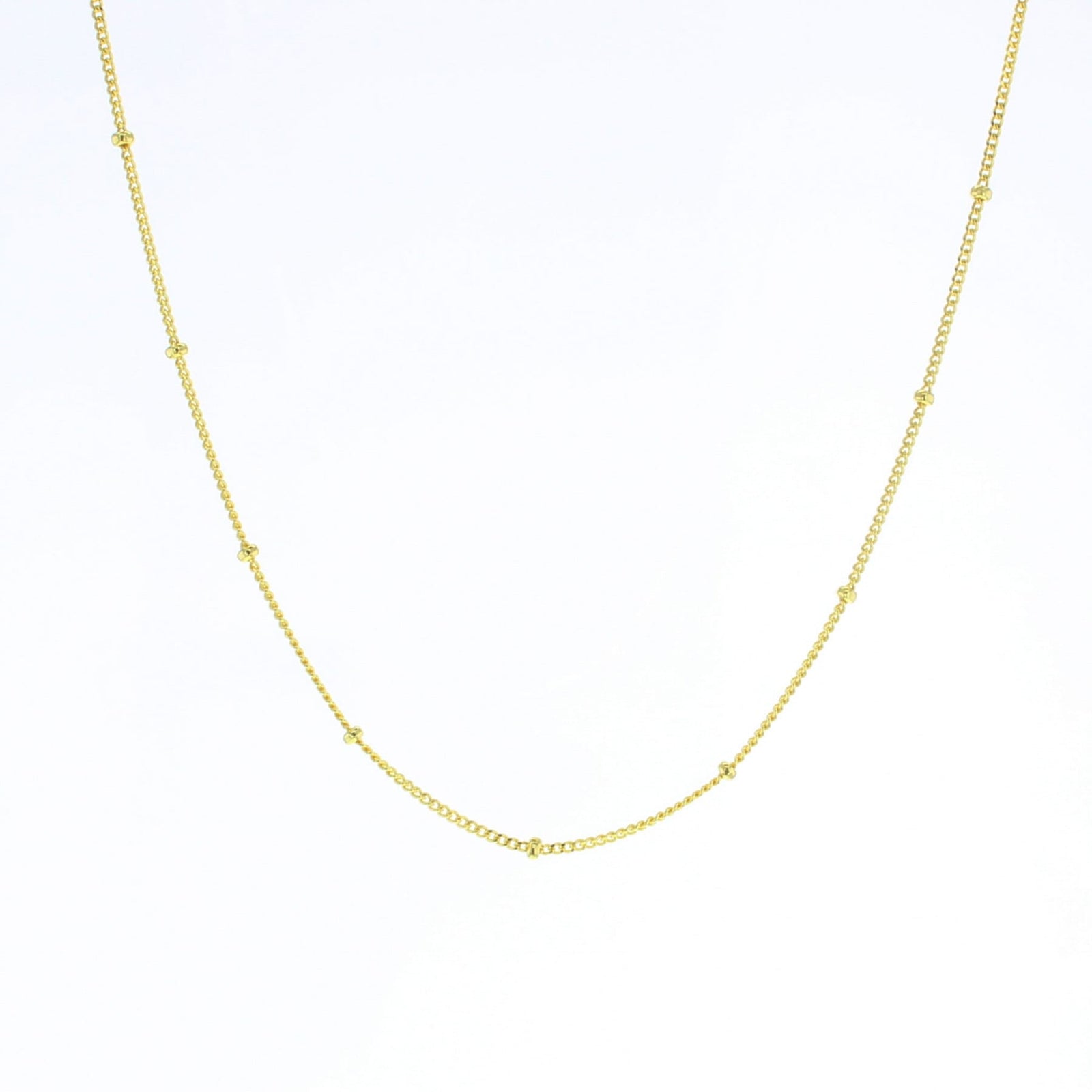 Beaded curb chain necklace in gold tone