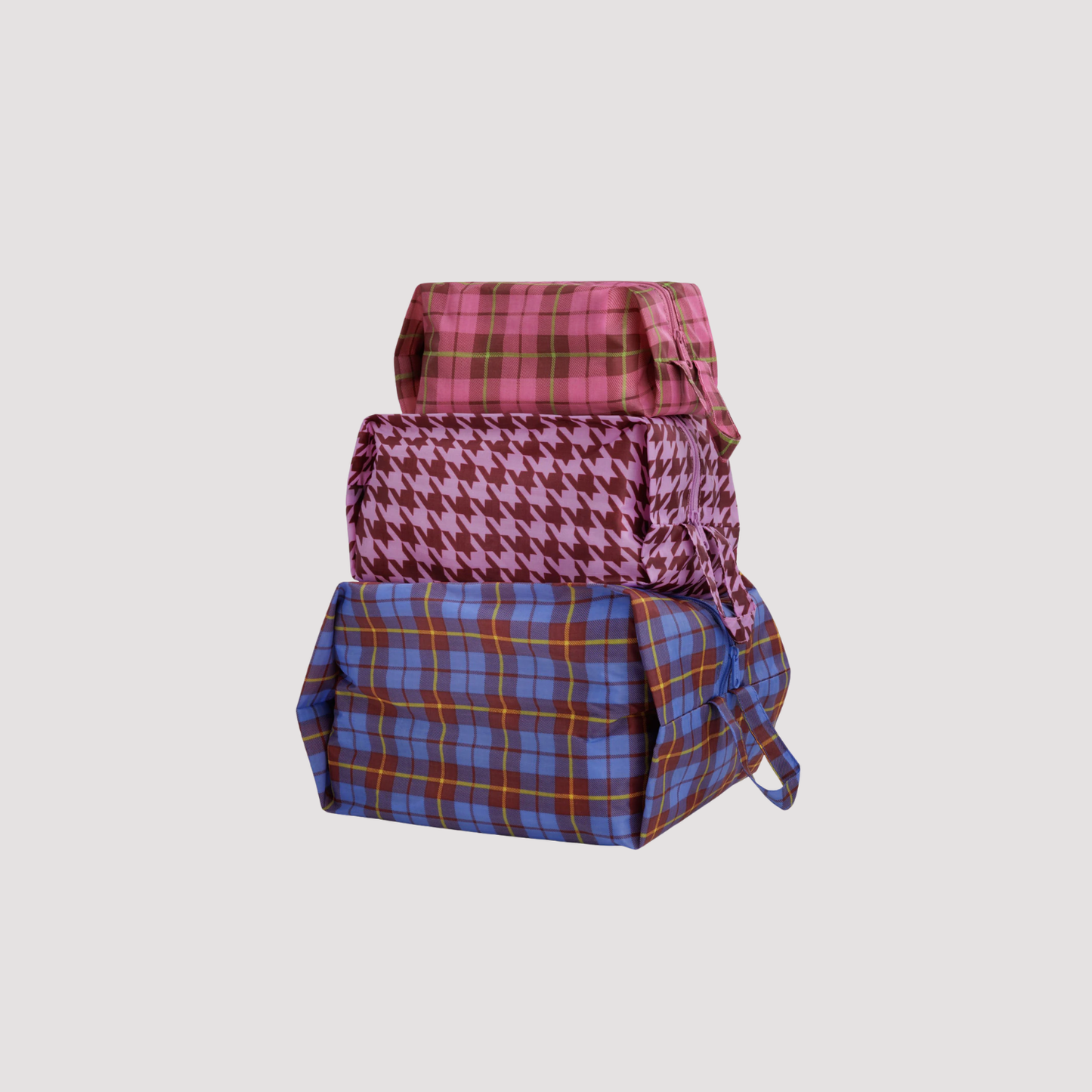 3D zip set with plaid and houndstooth prints in pink, blue, and orange