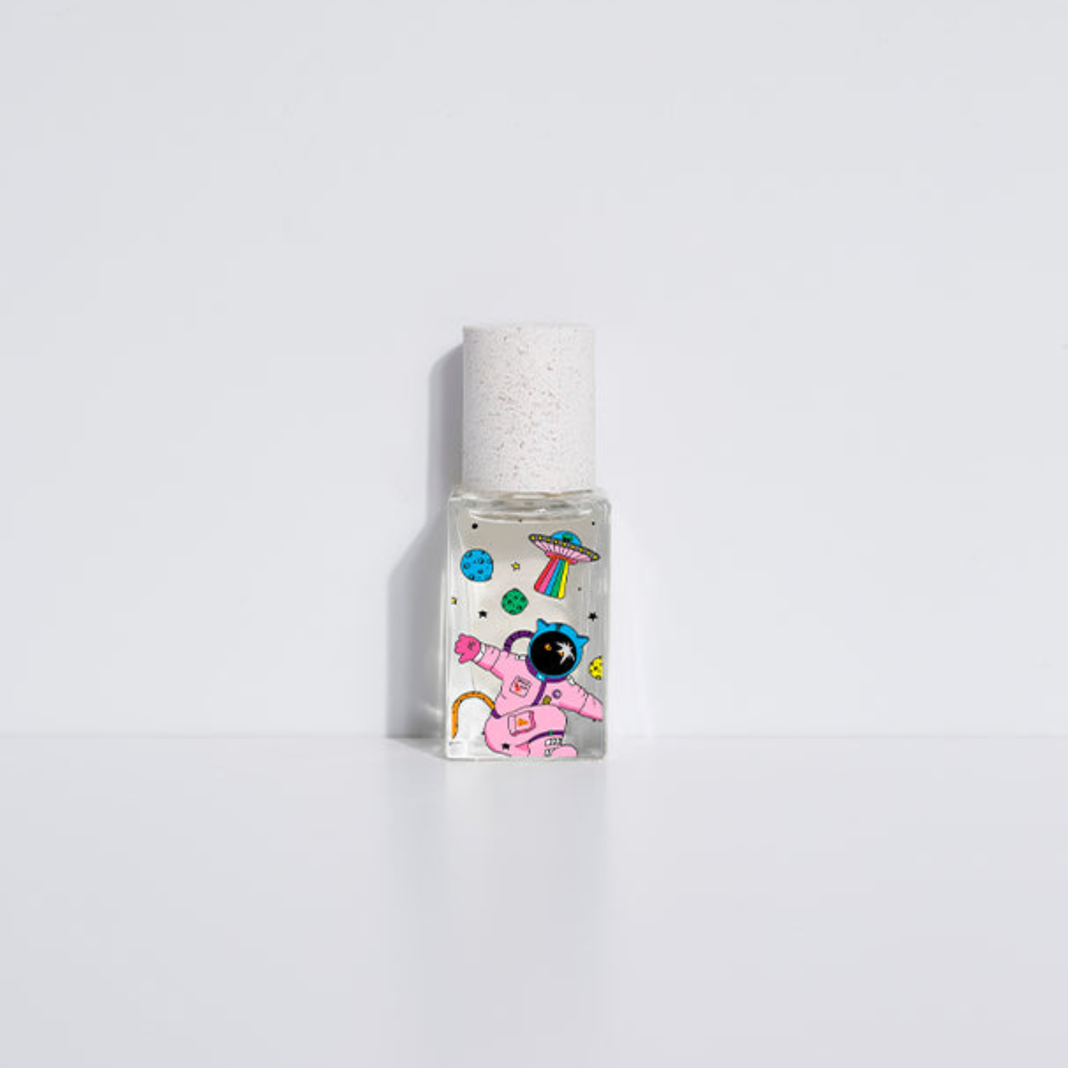 15 ml eau de parfum bottle with white cap and colorful cartoon-style label