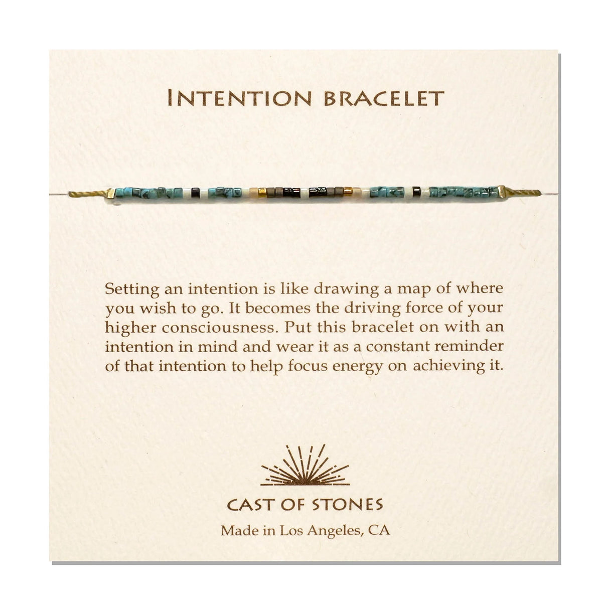 Intention bracelet with turquoise and black beads, gold cord, clasp end view