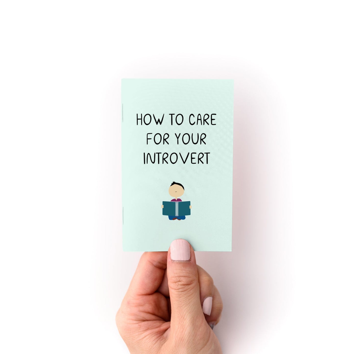 Introvert care zine cover, teal with title text and small person illustration