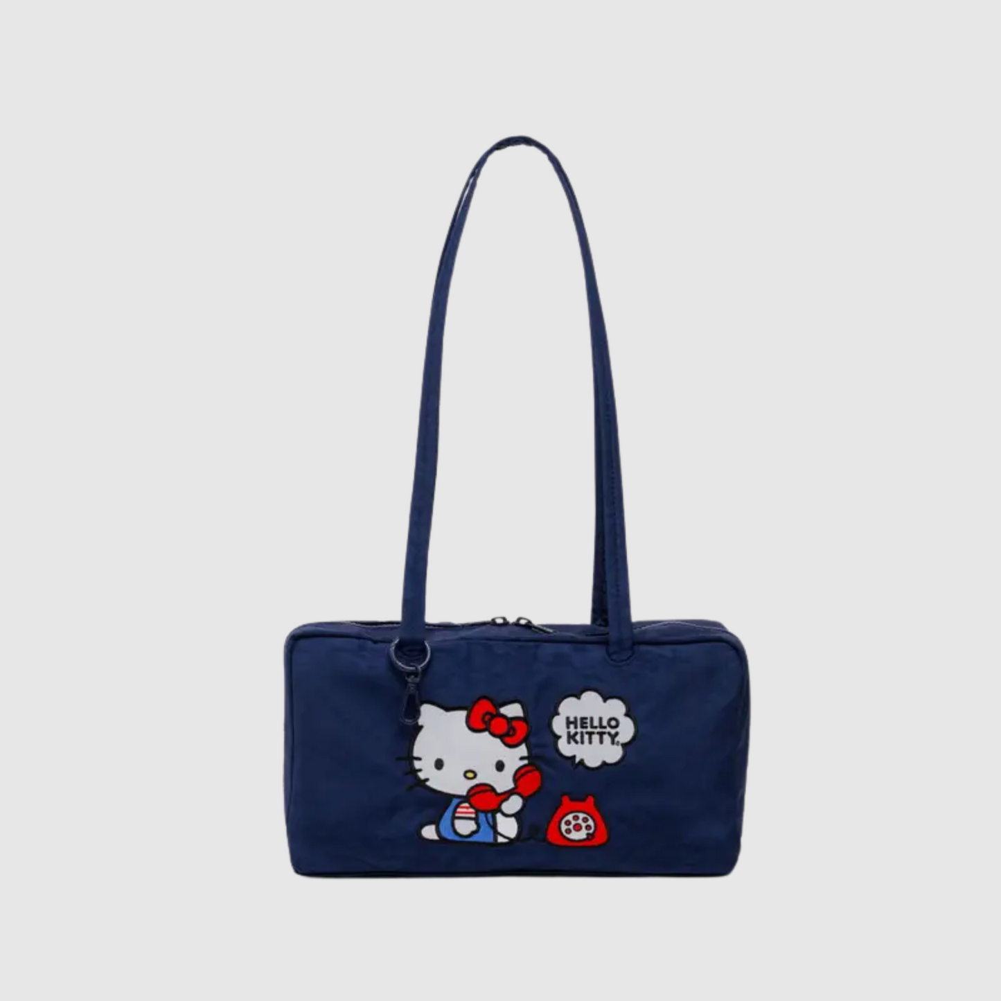 Nylon bowler bag in navy blue with Hello Kitty graphic, two top handles, zip closure.