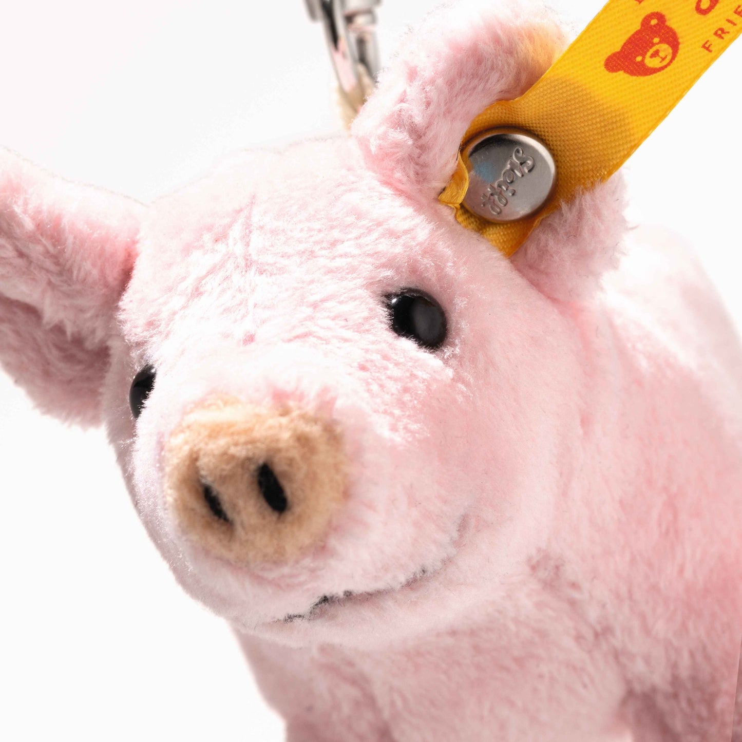 Pink plush pig face bag charm pendant with metal clip and yellow tag