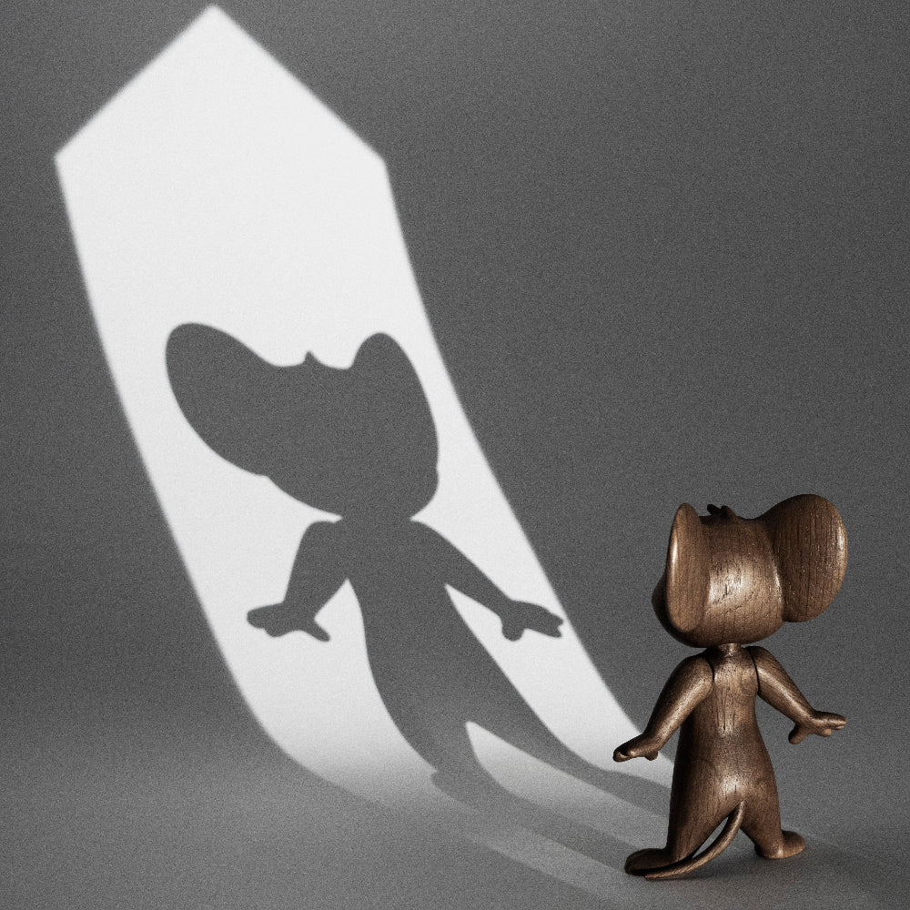 Small smoked oak figurine of a cartoon animal with arms out, standing pose
