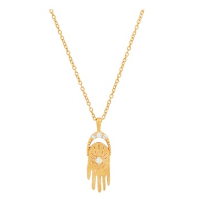 Gold-tone hamsa pendant necklace with small starburst details and dangling charm