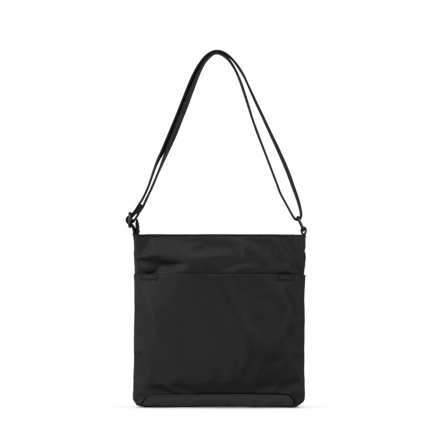 Black nylon crossbody bag with top zipper, adjustable shoulder strap, and front pocket