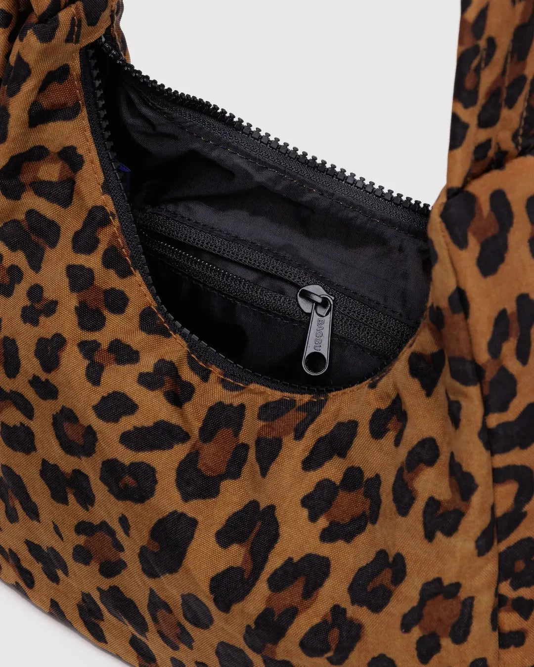 Leopard mini nylon shoulder bag with black interior and zipper pocket detail
