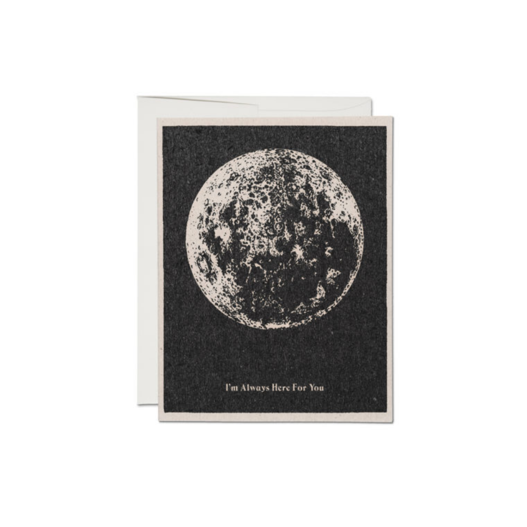 Dark moon greeting card with large white lunar illustration and small message at bottom