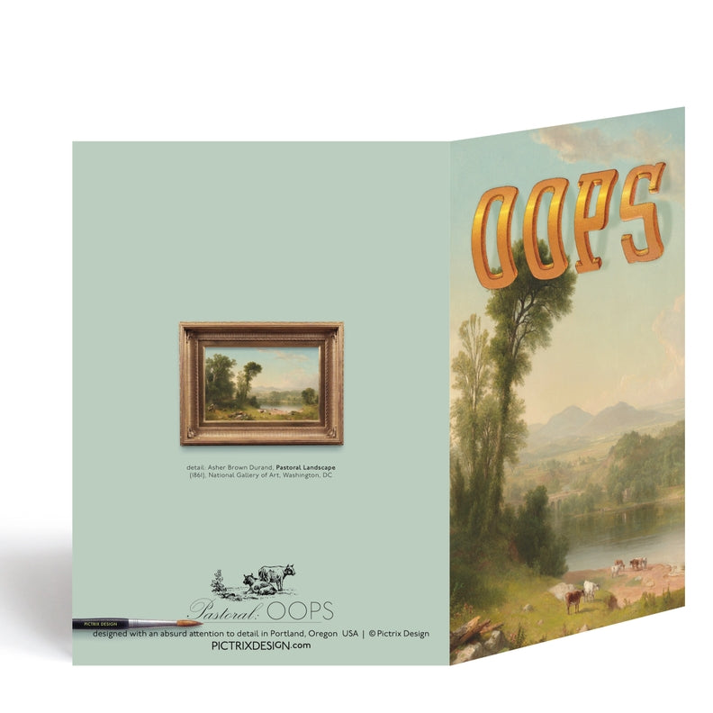 Folded greeting card showing framed landscape and OOPS text on front panel