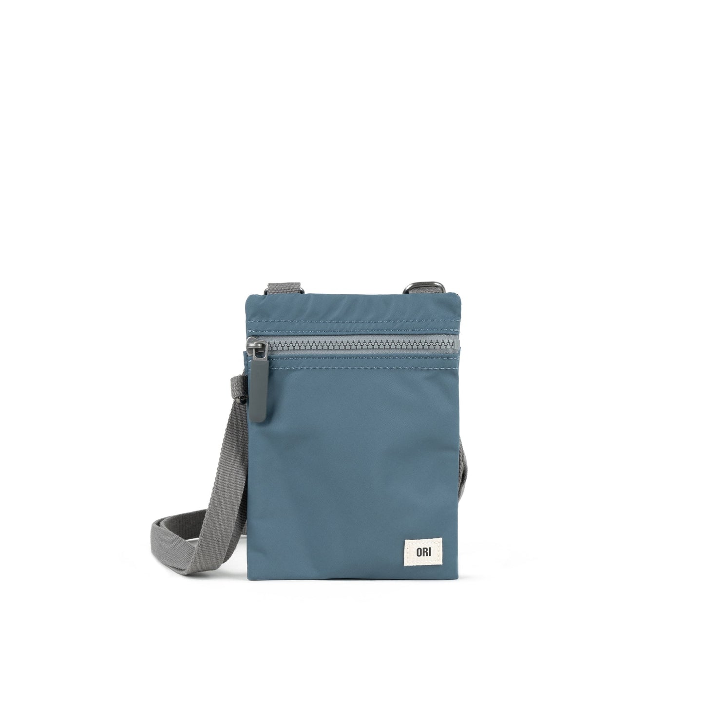 Light blue recycled nylon pocket crossbody bag with zip top and gray adjustable strap