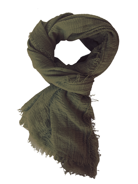 Olive gauze shawl with fringed ends, loosely draped in an infinity loop
