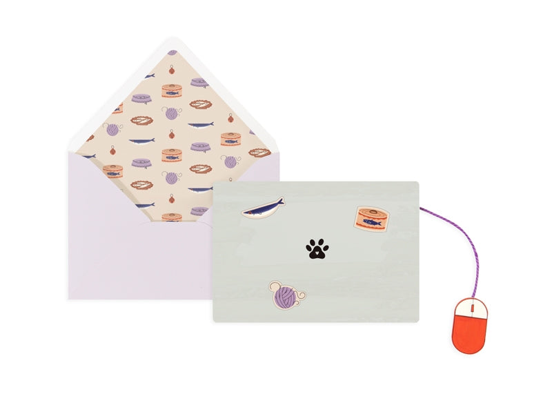 Birthday greeting card with pale envelope showing paw, yarn, and cupcake icons