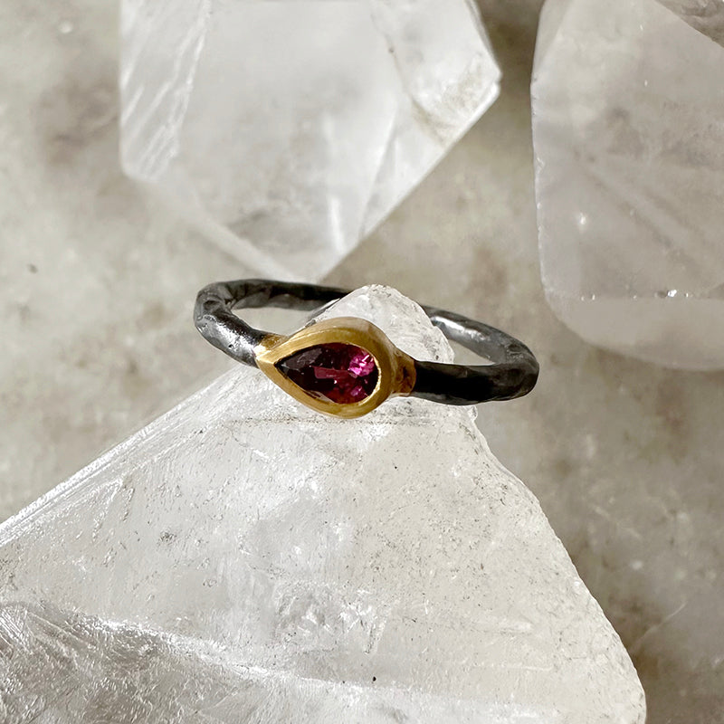 Oxidized silver ring with pink tourmaline and gold vermeil bezel