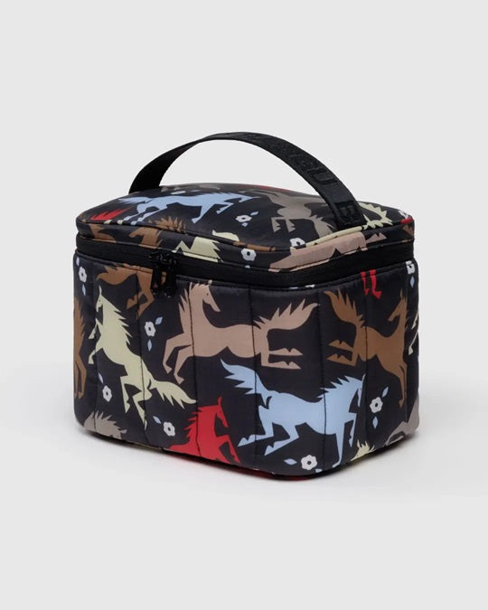 Puffy lunch bag with dark animal silhouette print, black handle and zipper top