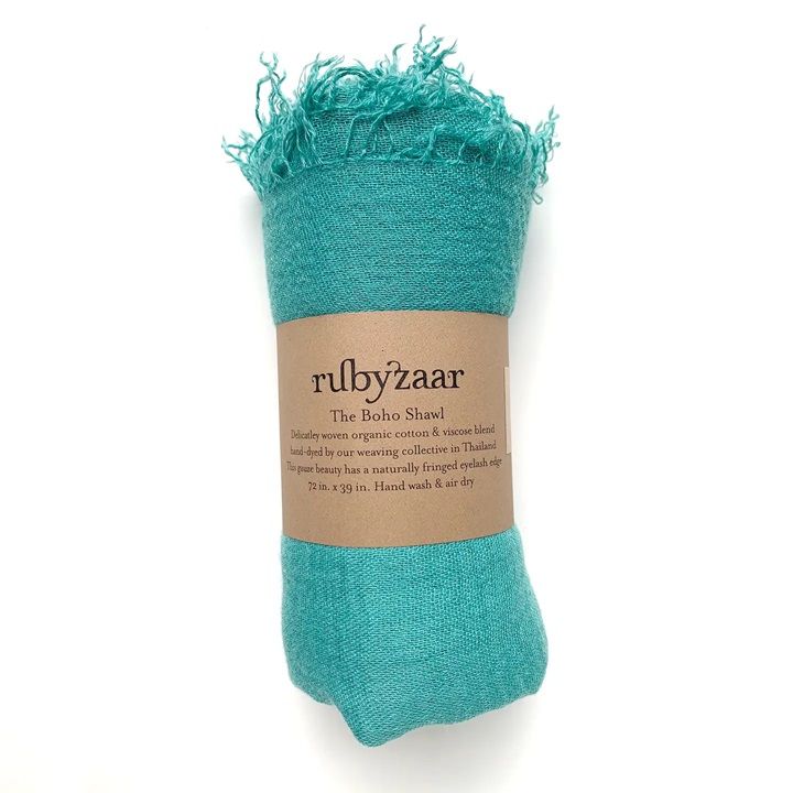 Aquamarine teal fringed shawl, rolled bundle with product label band