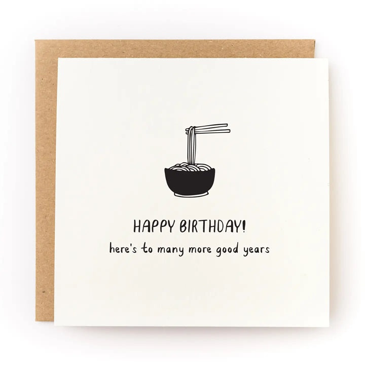 Birthday card with black noodle bowl icon and “Happy Birthday! here’s to many more good years”