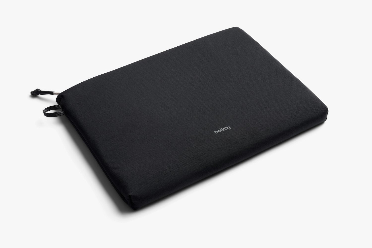 Black laptop sleeve with drawstring tie and padded fabric, slim profile