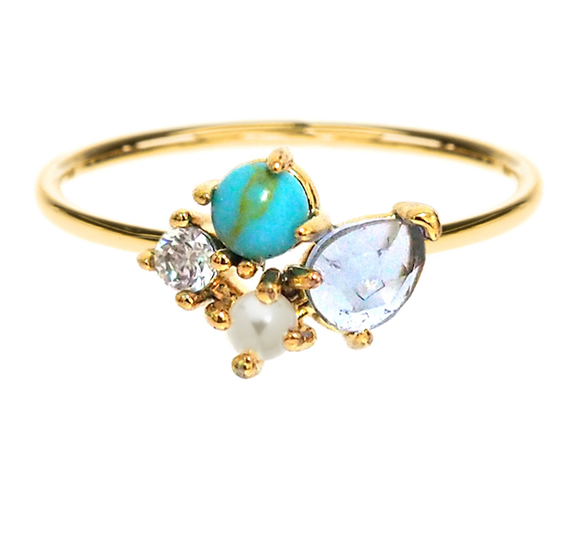 Gold-tone cluster ring with oval turquoise and blue stones, small clear accents