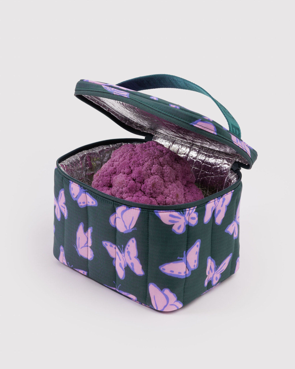 Puffy lunch bag with purple butterfly print, open top showing purple insulated interior