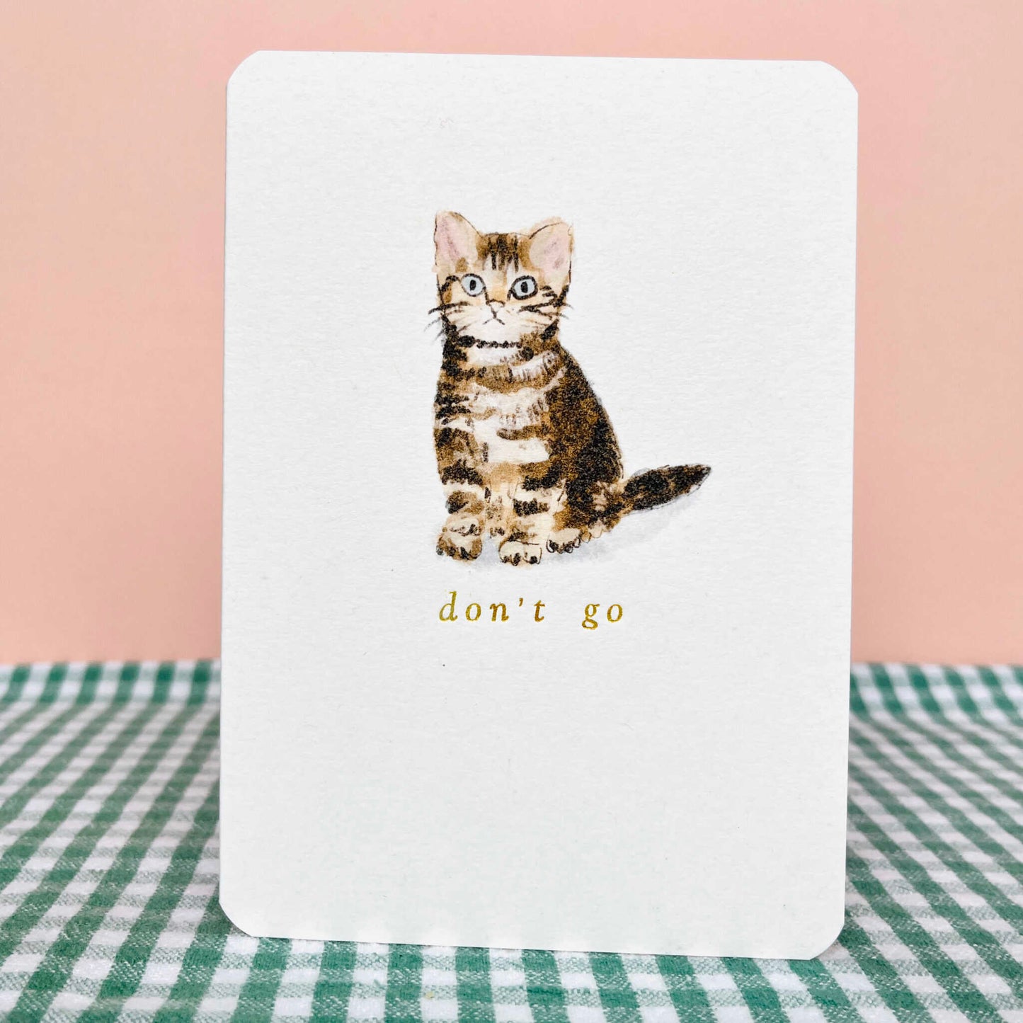 Greeting card with tabby kitten illustration and 'don't go' wording