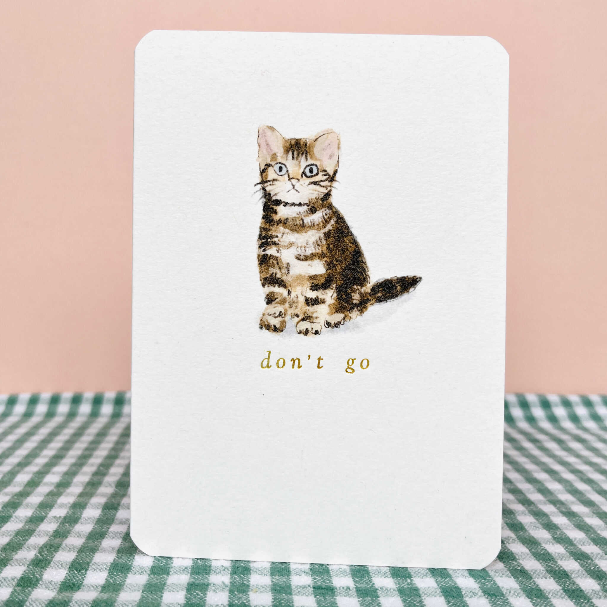 Greeting card with tabby kitten illustration and 'don't go' wording