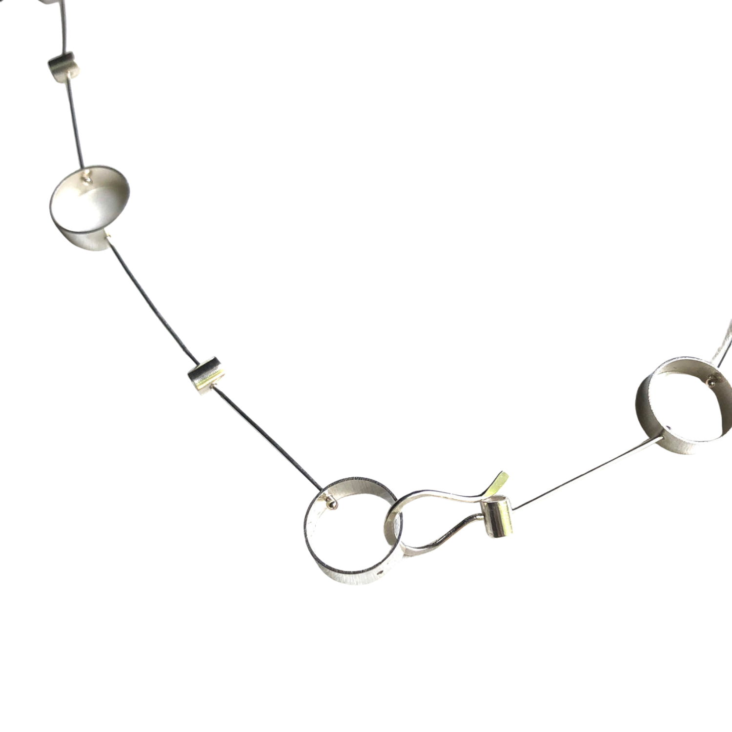 Silver-tone tube pivot necklace with round discs and small square insets