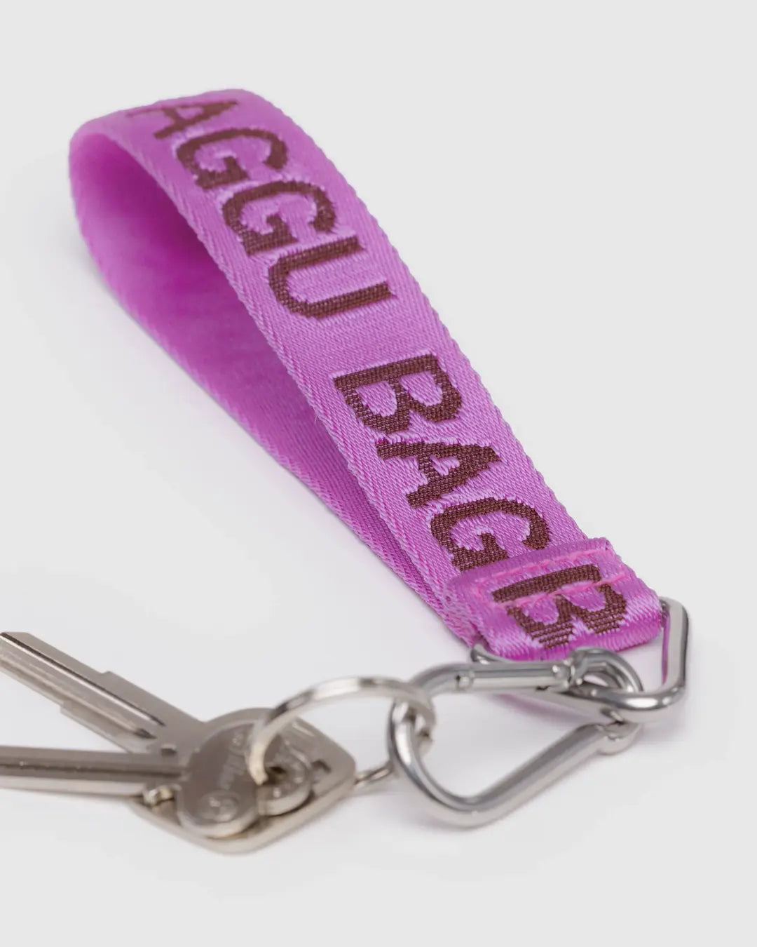 Purple logo keychain strap with metal keyring and attached keys