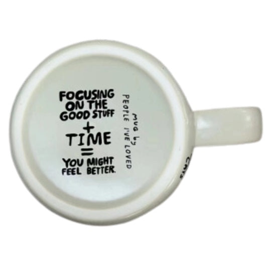 Ceramic mug base with quote 'FOCUSING ON THE GOOD STUFF' inside