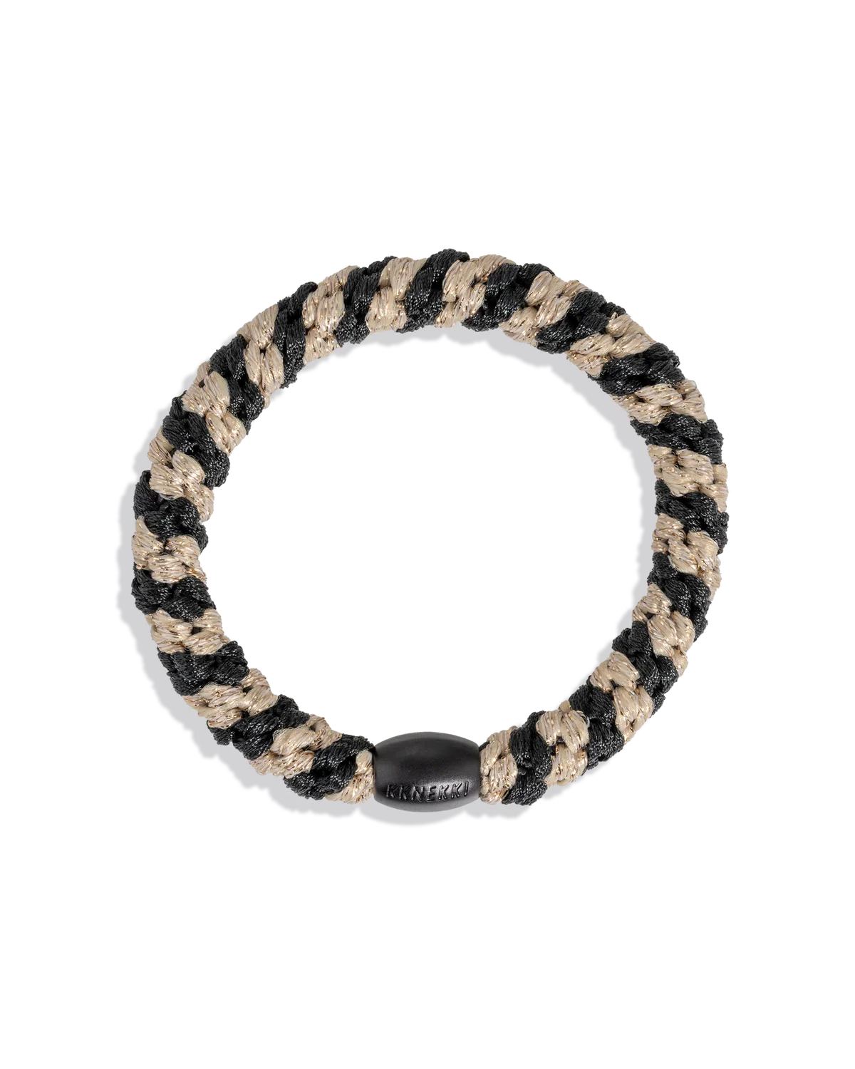 Woven glitter hair tie in black and beige with a dark oval center tag
