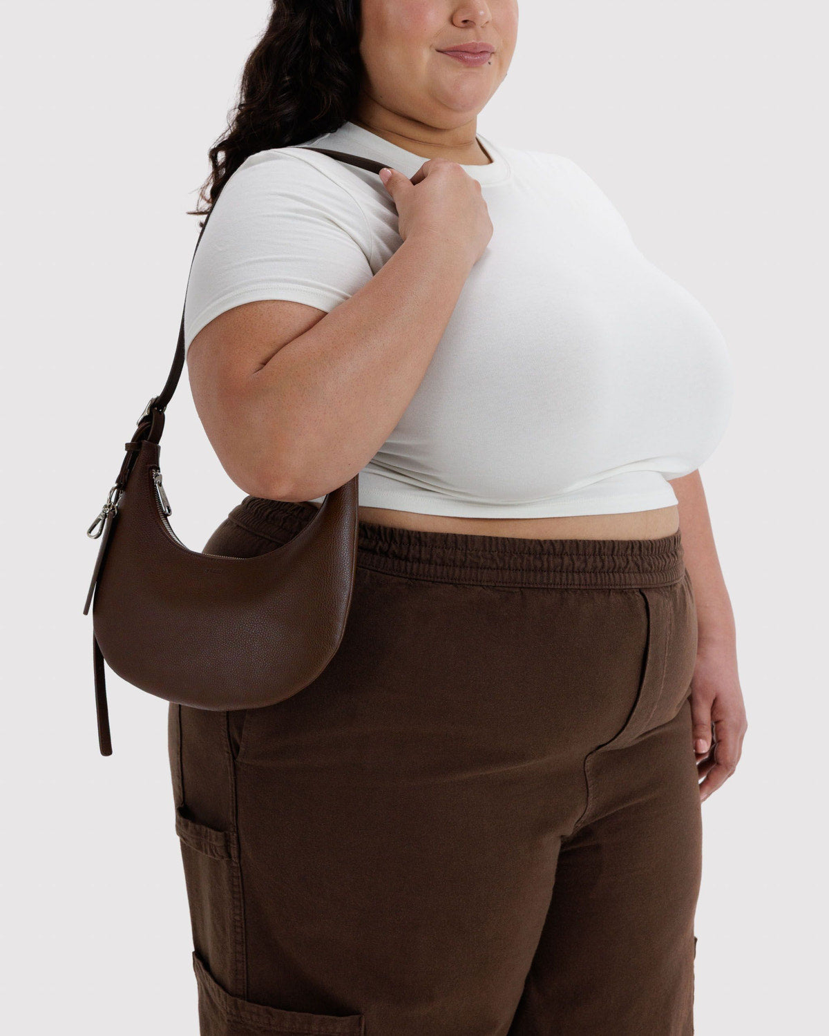 Brown recycled leather crescent hobo bag with zip-top and long shoulder strap