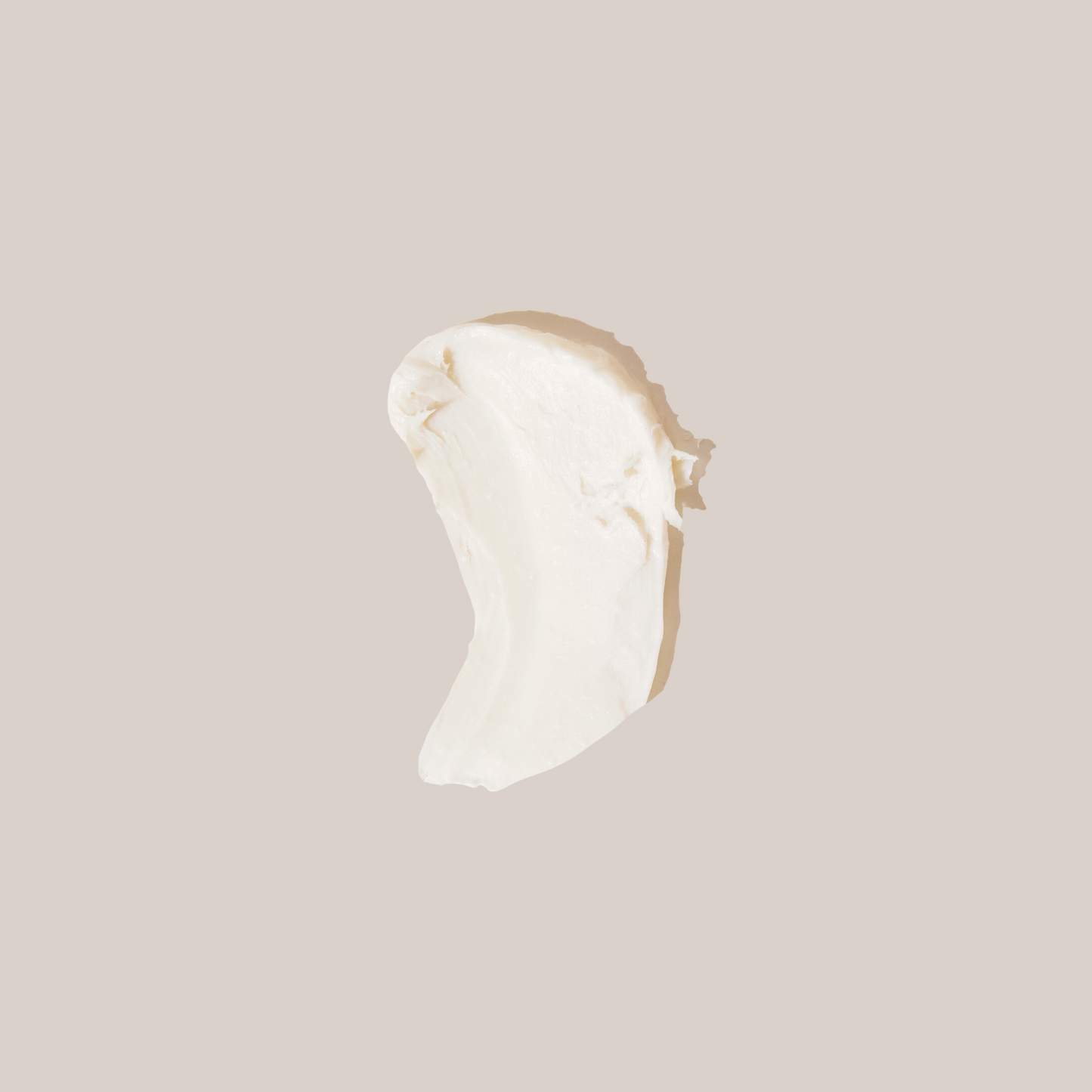 Unscented cream pomade dollop, thick white cream smear