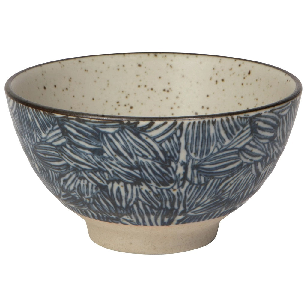Small ceramic bowl with speckled interior and blue leaf pattern outside