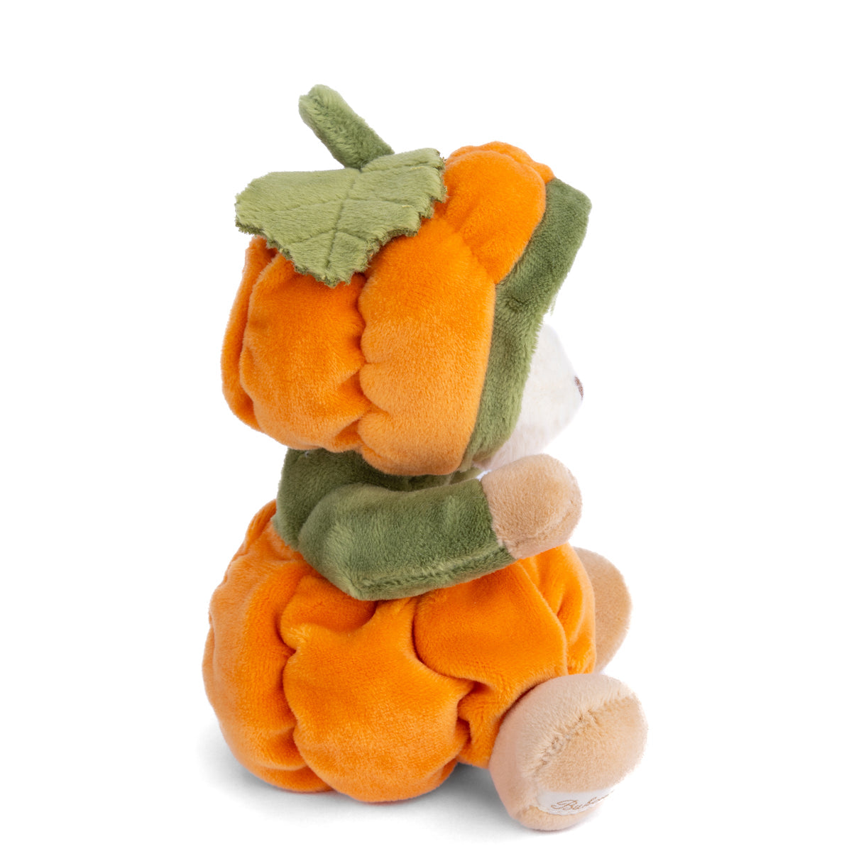 Pumpkin plush in orange tunic with green leafy hood, viewed from the side