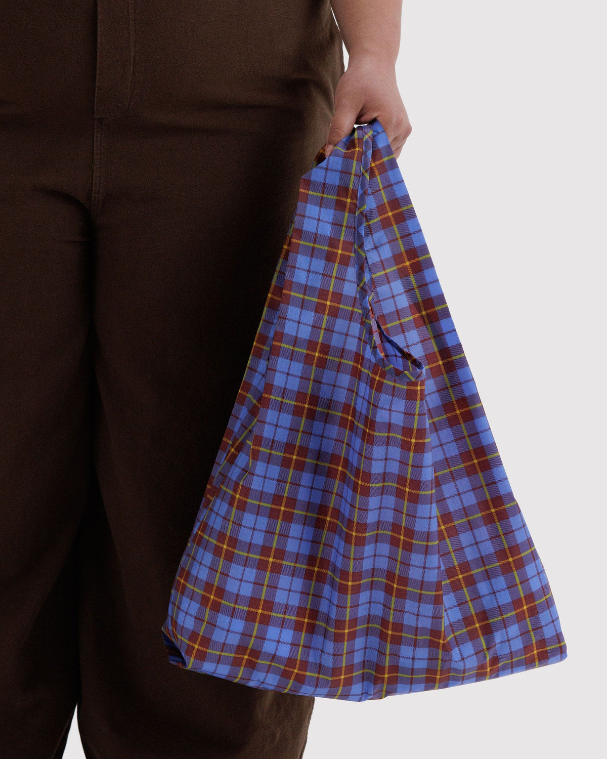 Reusable tote bag in blue and yellow plaid, gathered top with shoulder handles