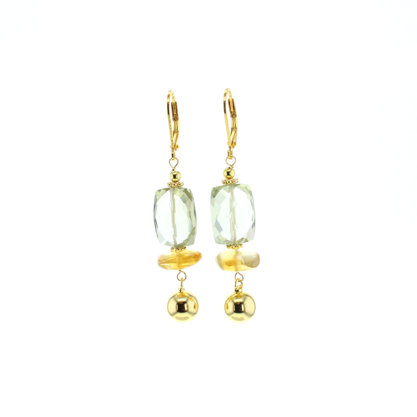 Gold-tone drop earrings with faceted light green stones and round dangling charms