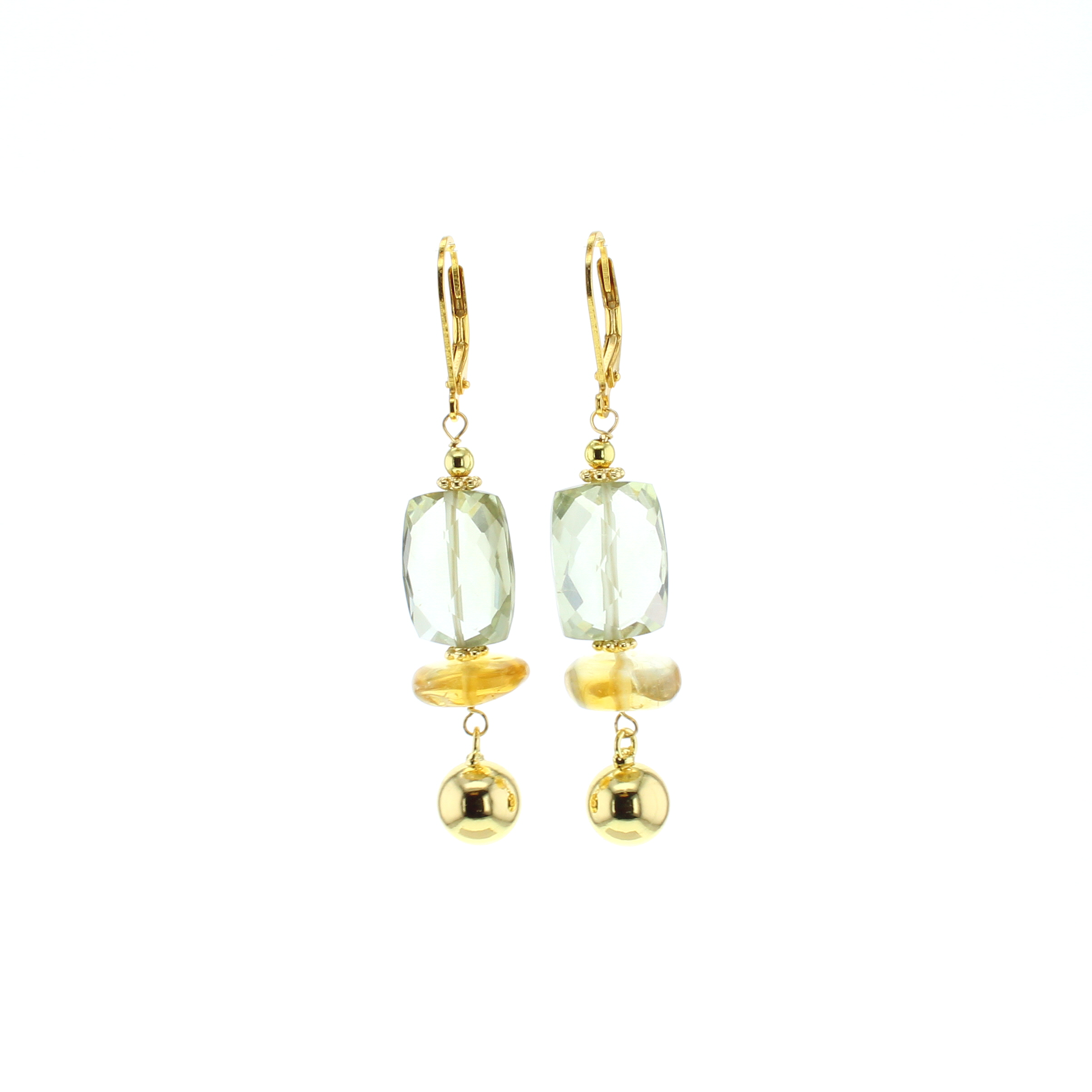 Gold-tone drop earrings with faceted light green stones and round dangling charms