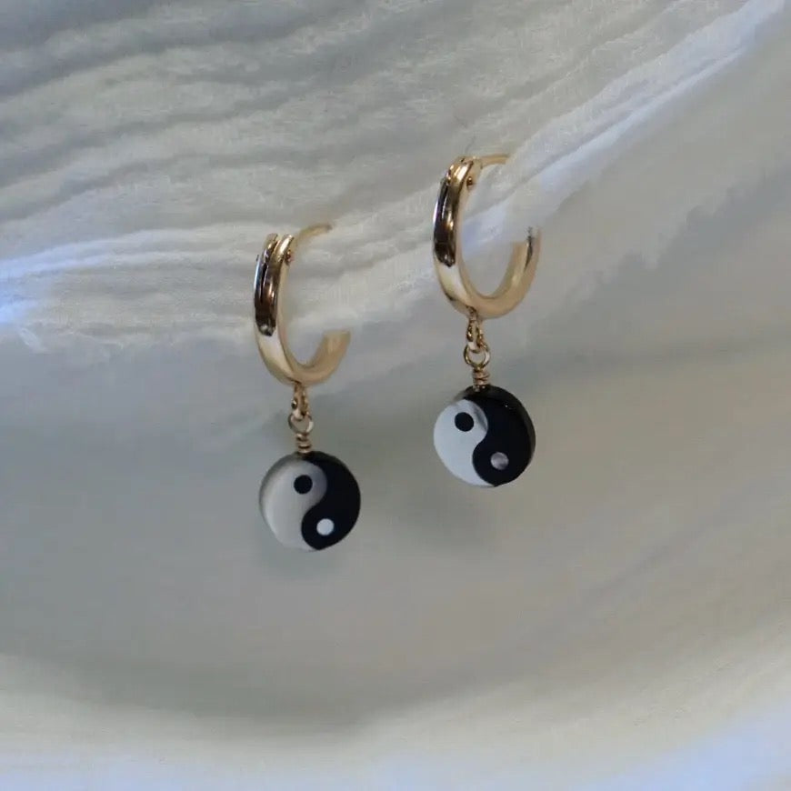 Mother of Pearl yin-yang hoop earrings with black and white enamel drops