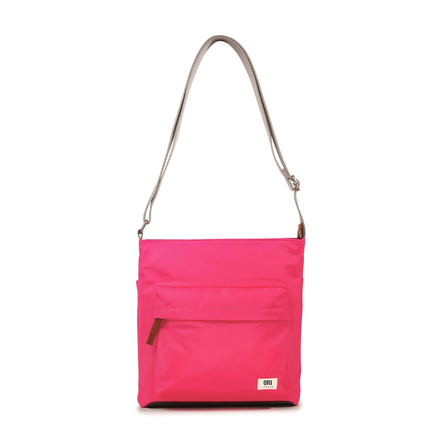 Sustainable nylon crossbody bag in hot pink with zip front pocket