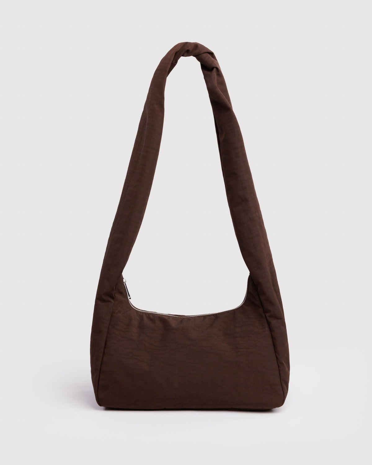 Nylon shoulder bag in coffee brown, rounded triangular shape with single strap.